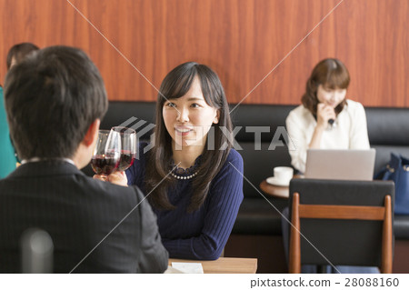 Couple toasting in a restaurant 28088160