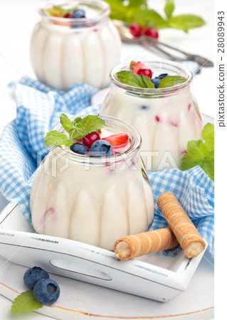 Yogurt with berries. 28089943