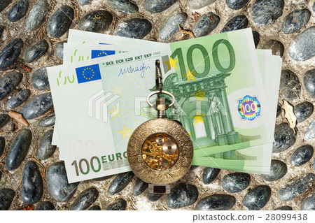 Euro banknotes and vintage pocket watch Euro banknotes and vintage pocket watch 28099438