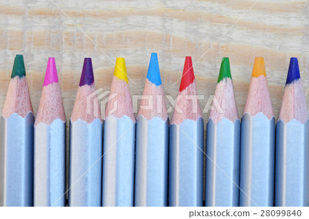 Close up Stack Colour Pencils on Wooden Background Close up Stack Colour Pencils on Wooden Background 28099840
