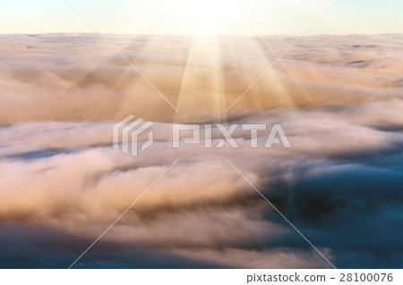 Sun over winter mountains, covered with snow. 28100076