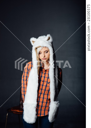beautiful sexy girl wearing white fur hat 28100375