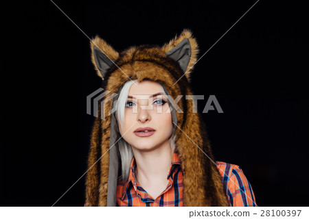 beautiful sexy girl wearing brown fur hat 28100397