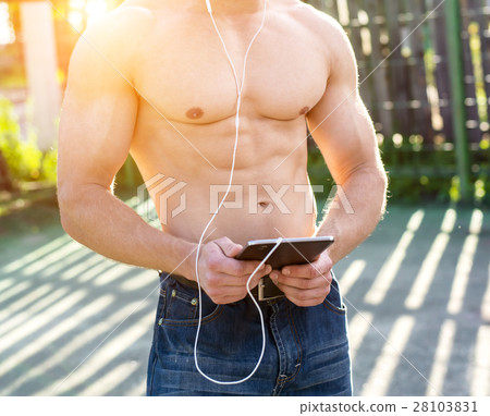 Athletic with a clipboard watching a movie 28103831