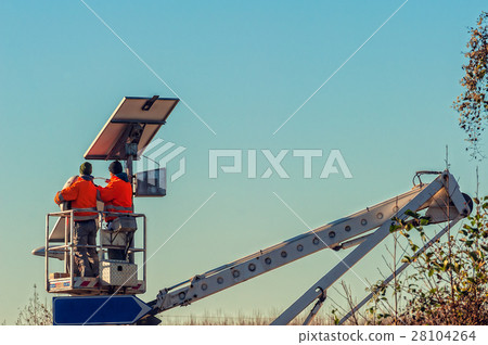 Maintenance of streetlight. Workers. Maintenance of streetlight. Workers. 28104264