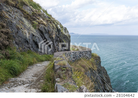 Stone rocks mountain path at Irish seacoast. 28104642