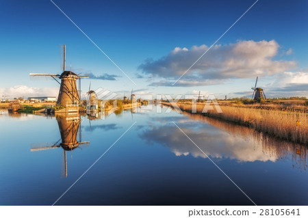 Rustic landscape with beautiful windmills Rustic landscape with beautiful windmills 28105641