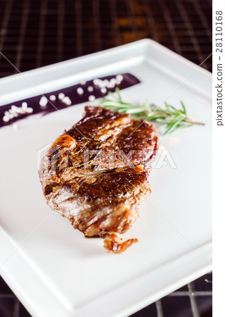 tasty steak with sauce 28110168