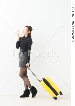 A woman drawing a suitcase A woman drawing a suitcase 28110416