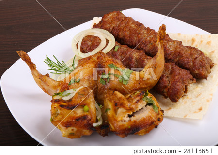 Beef kebab and grilled Quail Beef kebab and grilled Quail 28113651