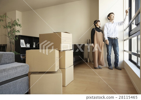 A couple looking at the tower apartment new life view 28115465