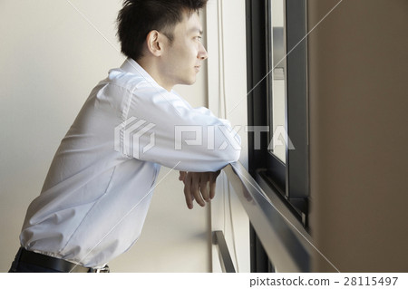 Men watching the tower apartment views Men watching the tower apartment views 28115497