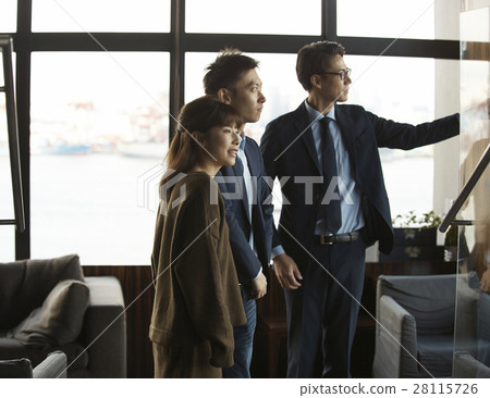 Tower apartment looking couple 28115726