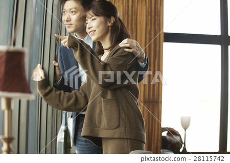 Tower apartment looking couple 28115742