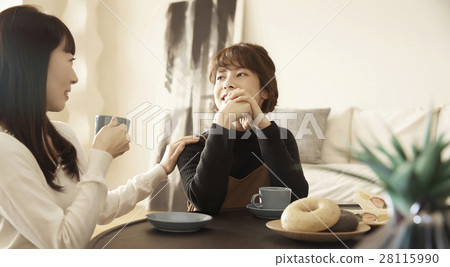 Women enjoying tower apartment chat Women enjoying tower apartment chat 28115990