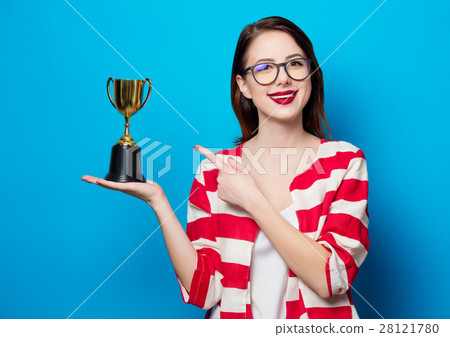 young smiling woman with cup trophy 28121780
