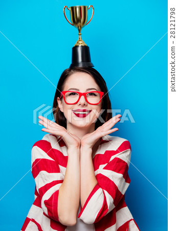 young smiling woman with cup trophy 28121798