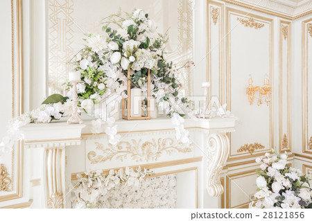 Luxurious vintage interior with fireplace in the Luxurious vintage interior with fireplace in the 28121856