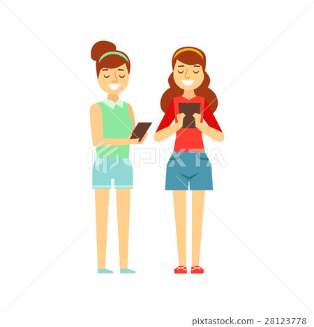 Two Girls Tooking At Their Tablets Standing 28123778