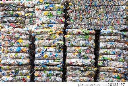 Close up compressed plastic cans for recycle 28125437