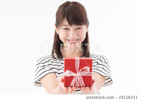 A woman giving a present A woman giving a present 28126231