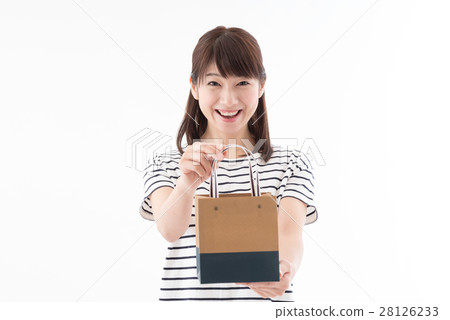 A woman giving a present A woman giving a present 28126233
