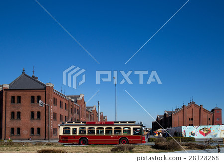 A red brick warehouse Goes in front 28128268