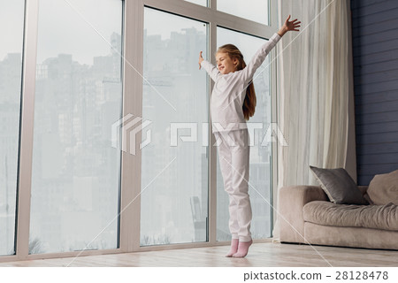 Happy child waking up at home 28128478