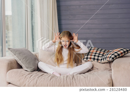 Naughty kid having fun at home 28128480