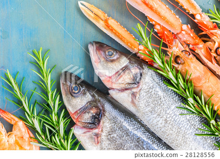 Fresh seafood on blue background 28128556