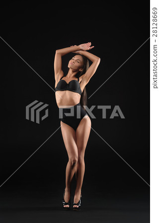 Sexy african woman in seductive lingerie Sexy african woman in seductive lingerie 28128669