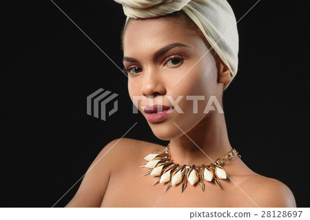 Pretty mulatto woman in traditional ethnic 28128697