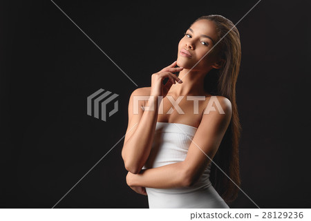 Flirty african girl standing and posing 28129236