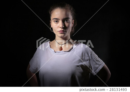 portrait of a beautiful woman with black background 28131493