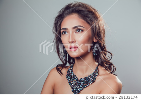young beautiful woman with make-up in a chic young beautiful woman with make-up in a chic 28132174