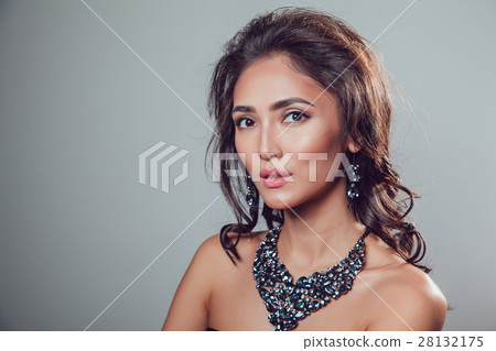 young beautiful woman with make-up in a chic 28132175