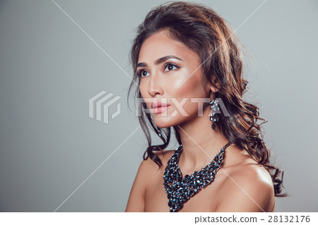 young beautiful woman with make-up in a chic young beautiful woman with make-up in a chic 28132176