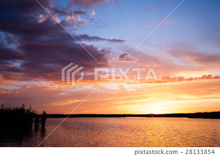 Sunset over water Sunset over water 28133854