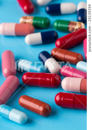 Different multicolored pills and medicine capsules Different multicolored pills and medicine capsules 28139394