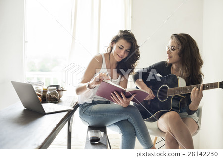 Lesbian Couple Together Indoors Concept Lesbian Couple Together Indoors Concept 28142230