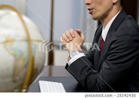 A businessman with hands A businessman with hands 28142438