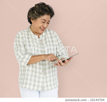 Mature Woman Holding Tablet Concept 28144704