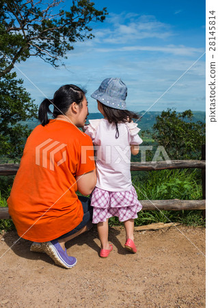 Happy family relaxing outdoors, travel on vacation Happy family relaxing outdoors, travel on vacation 28145814