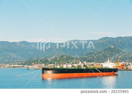 Barge Freight Ship In Port Dock On Sunny Evening Barge Freight Ship In Port Dock On Sunny Evening 28155941