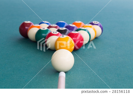 Focus on cue aiming white ball to break billards 28156118