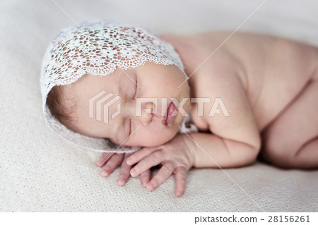 newborn sleeping on stomach light background, newborn sleeping on stomach light background, 28156261