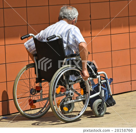 Old man in a wheelchair 28158760