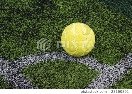Old yellow soccer ball Old yellow soccer ball 28160891