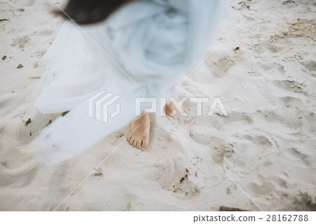 Bride walking barefoot. Bride walking barefoot. 28162788