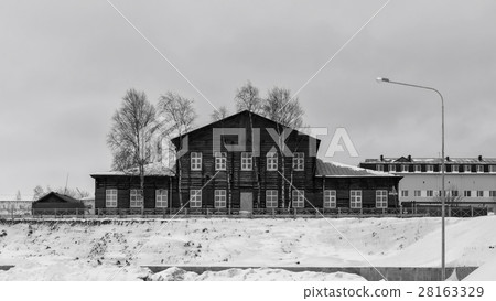 Old wooden house in city 28163329